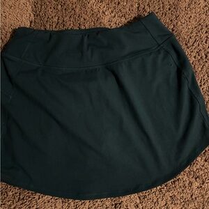 Tennis skirt. Super comfy, darker turquoise color. Worn for a golf a few times.